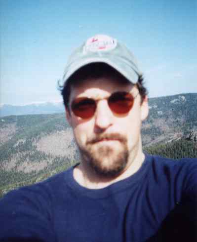 Photo of self in front of view of Presidential Range, Mt. Crawford, White Mountains, New Hampshire